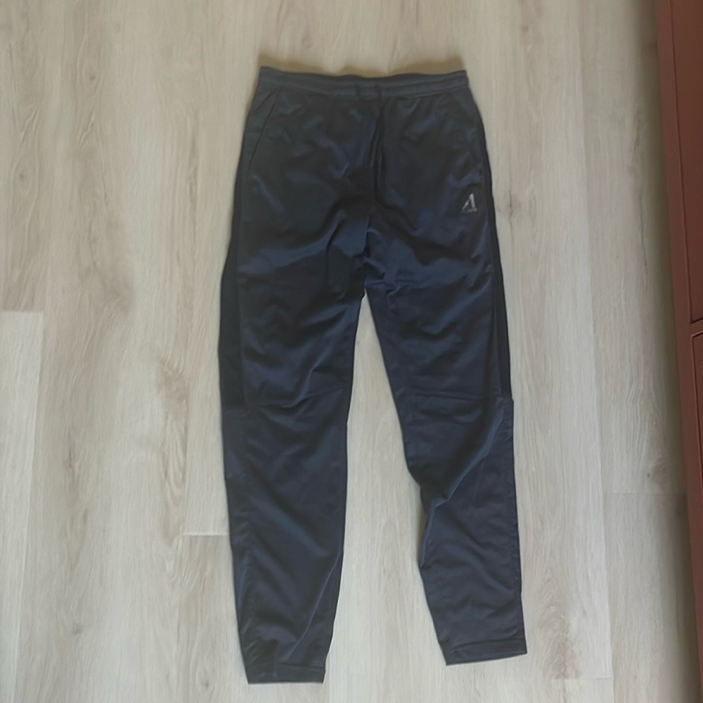 Kids jogger pants size M quick dry material dark grey color good condition